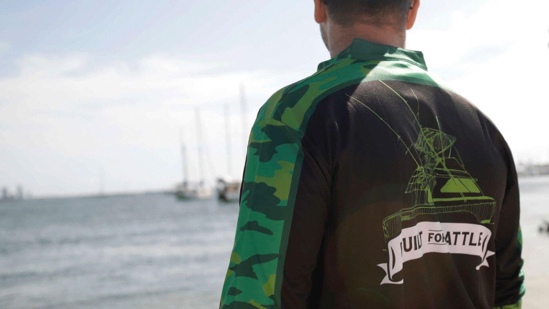 Man Wearing A Green Printed Sublimated Fishing Shirt