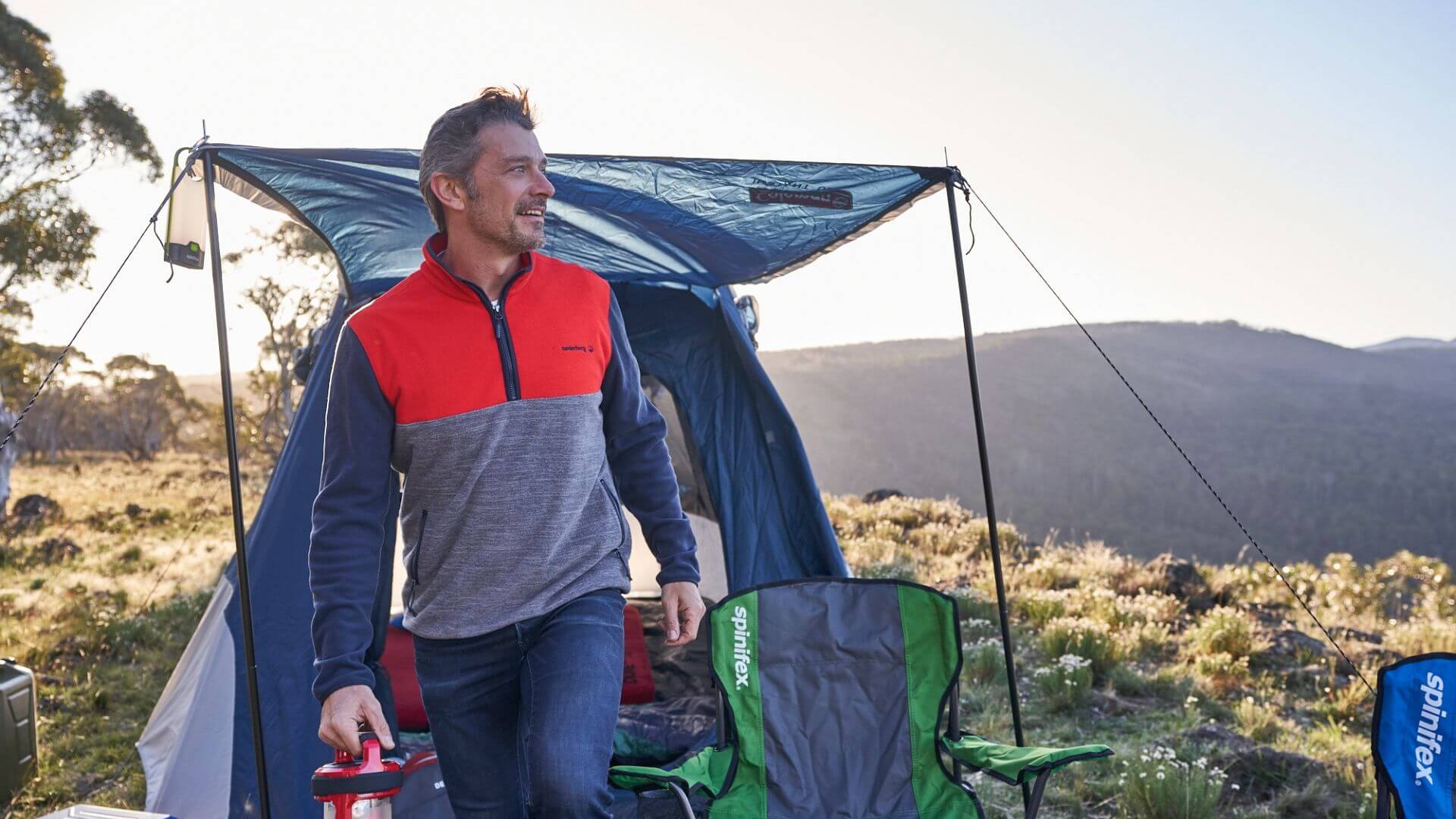 Man Camping In Fleece Clothing