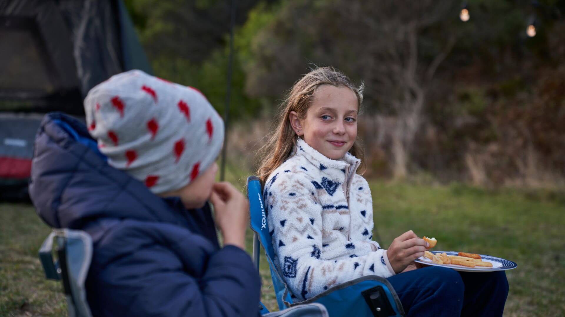 Kids In Campsite With Fleece Jackets