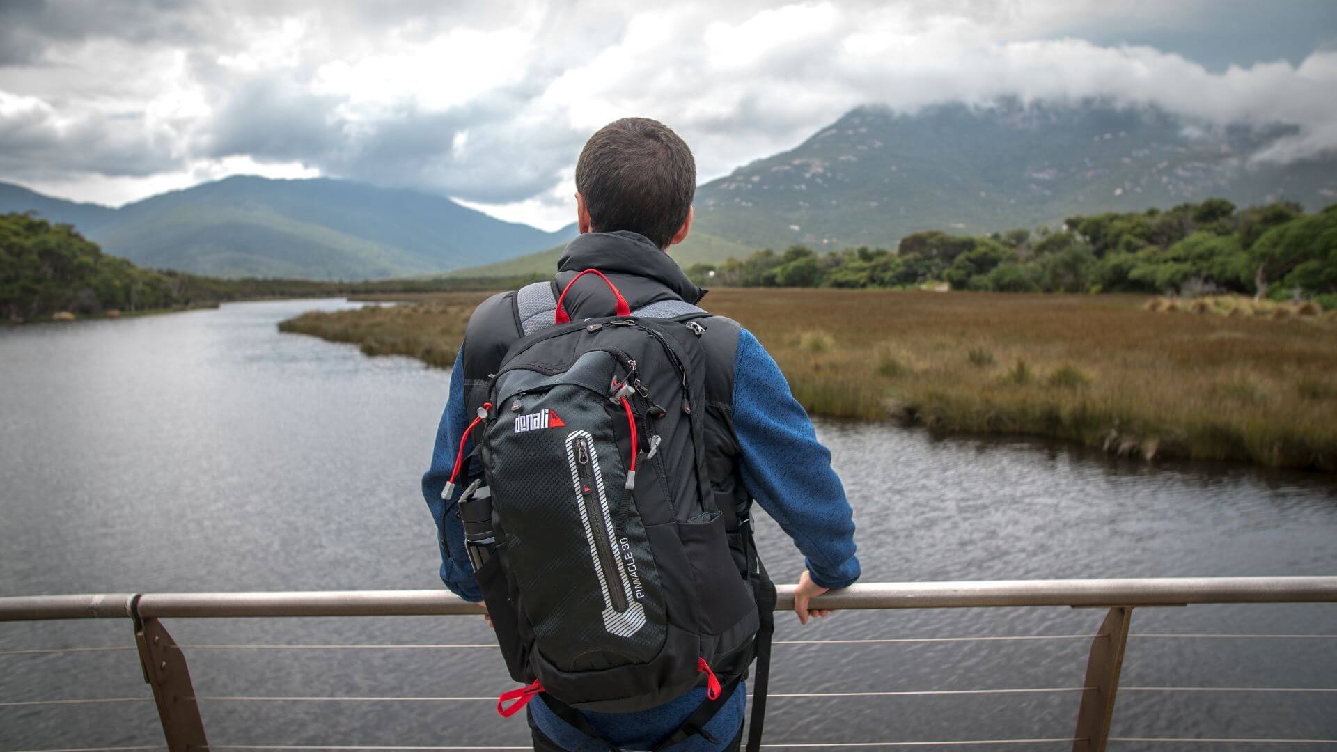 Man In Fleece Clothing & Denali Backpack