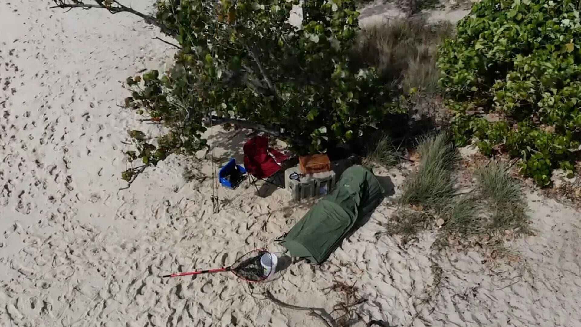 Couple In Dune 4WD Rooftop Tent