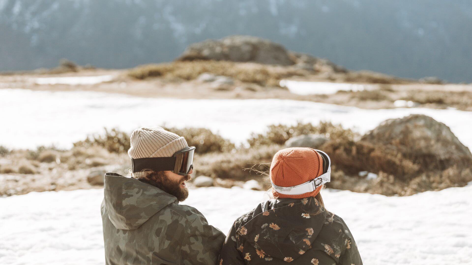 Man & Woman In Snow Gear